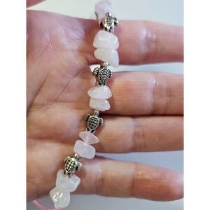 Silver tone turtle with rose quartz bracelet